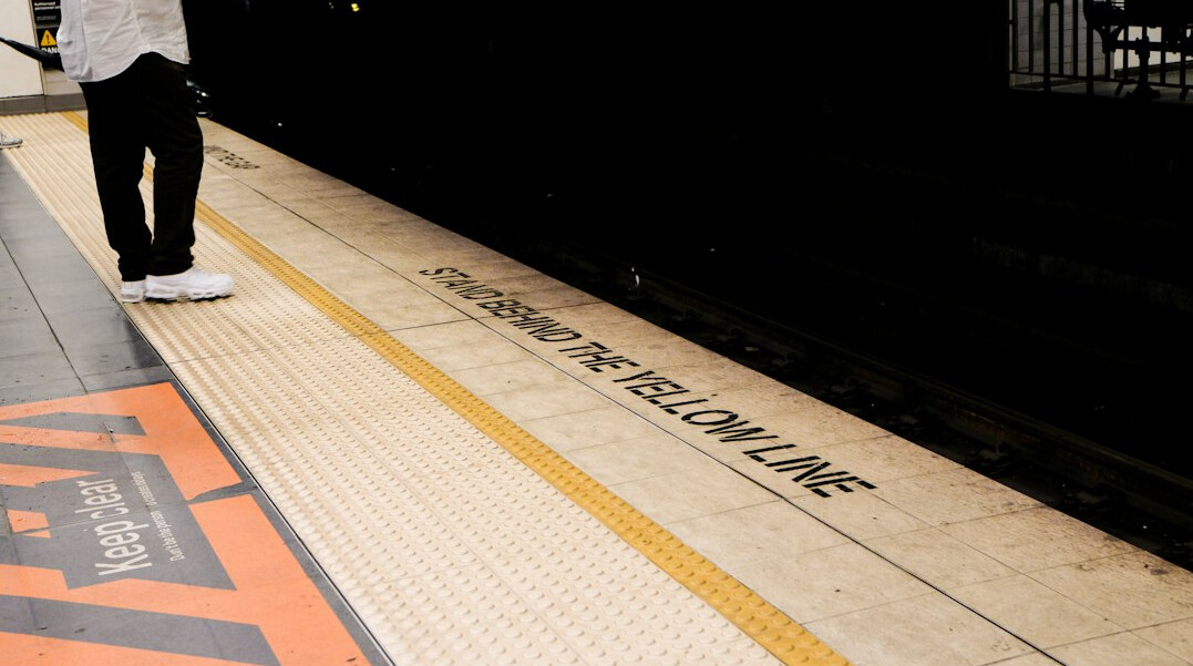 Commuters waiting on a subway platform